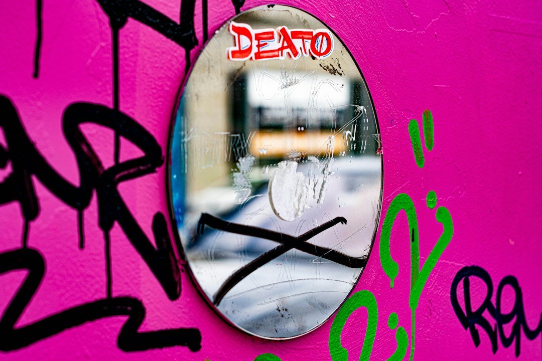 red and green wall with glass